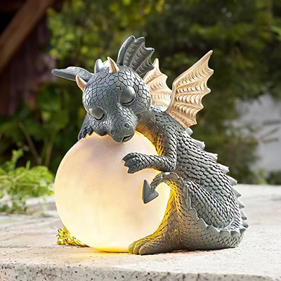 Cute Dragon Sleeping on Glowing Orb Statue